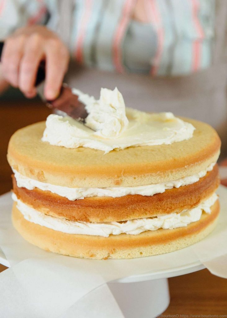 Stack the layers and crumb coat the cake