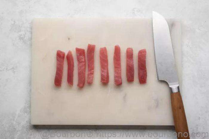 Slice the tuna into long and think sticks (as shown in the picture)