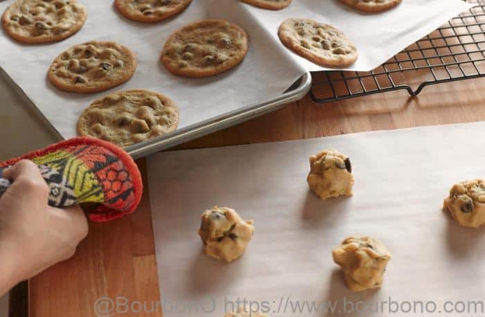 Reusing parchment paper will help to reduce quite significantly your cost and waste per bake