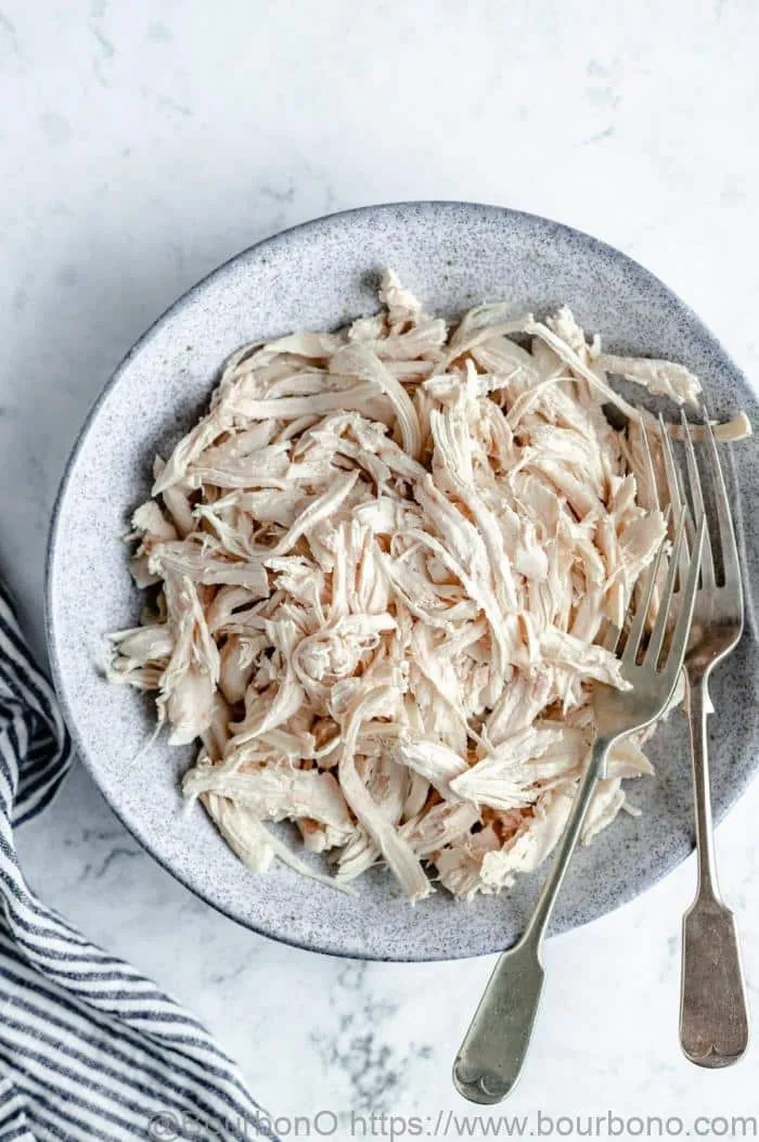 The chicken meat in Chicken Salad Chick Sassy Scotty Chicken Salad can be shredded easily using forks